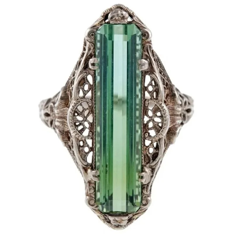 Vintage-style luxury women's rings by CAOSHI, featuring intricate designs and elegant details in a close-up image.