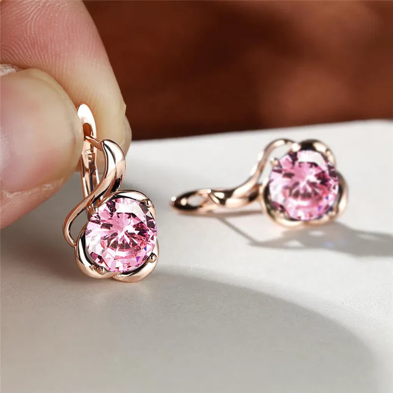 Rainbow cubic zirconia floral mystical earrings with intricate design, featuring vibrant, shimmering stones for a unique jewelry look.
