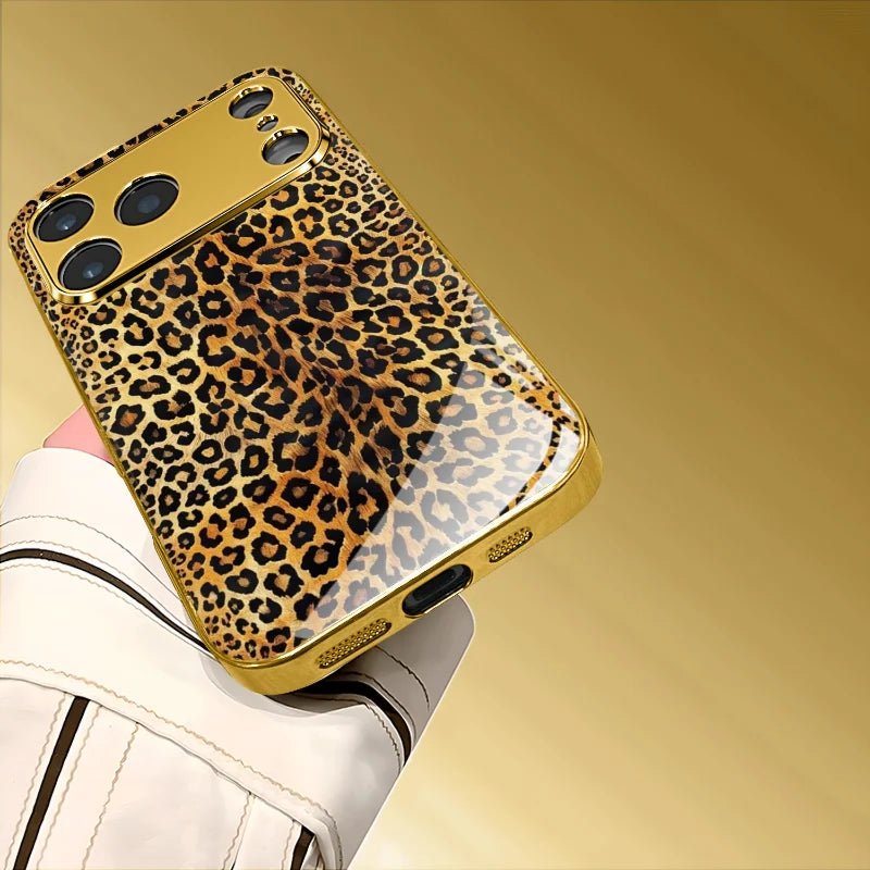 Tempered glass phone case with decorative stamped design by Corporación Turística, showing a clear protective cover with artistic details.
