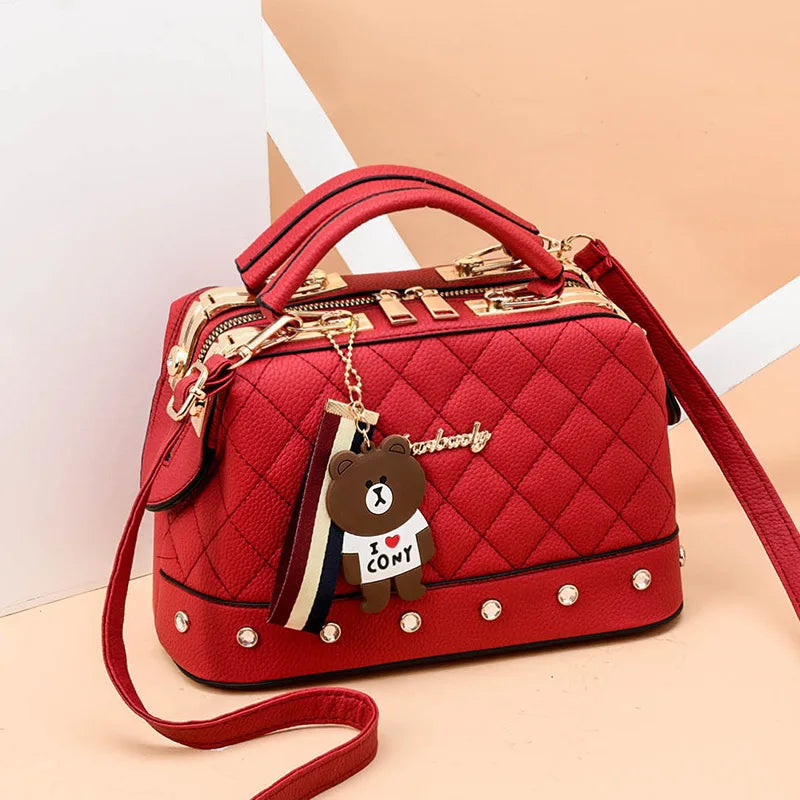 Small high-quality square women's handbag by Corporación Turística, featuring a stylish and compact design with a sleek appearance.
