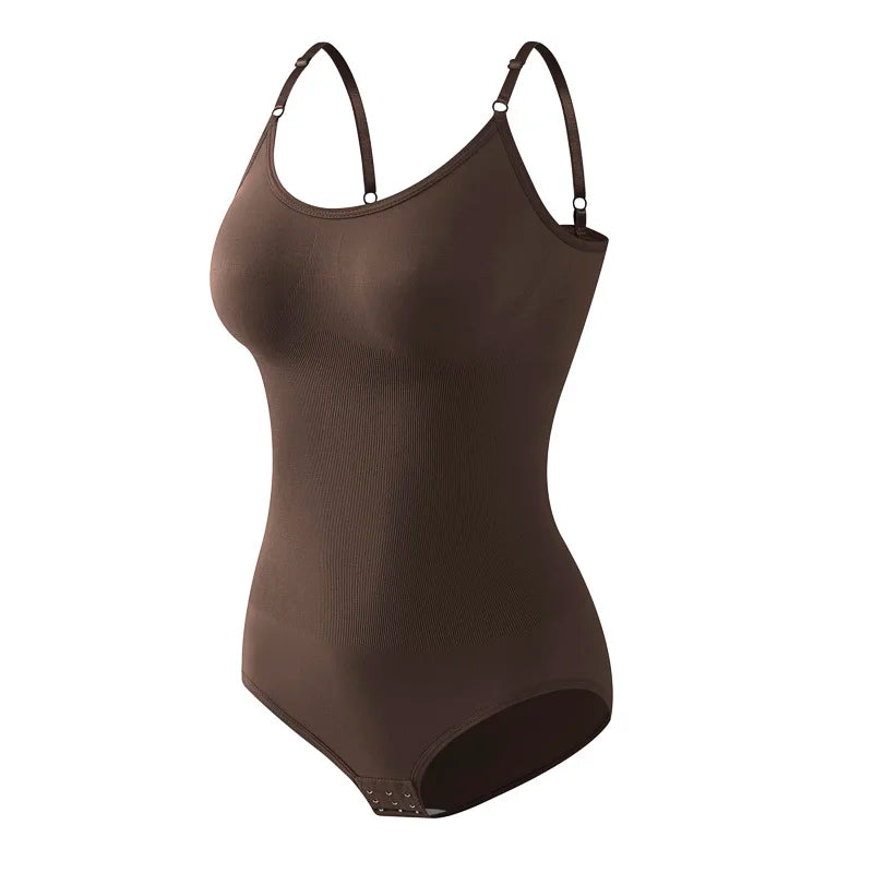 Woman wearing black compression shaping clothing by Corporación Turística, designed for body contouring and support.
