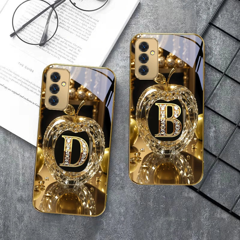 Gold crystal phone case with letter 'A' from Corporación Turística, designed for a sleek, elegant look.