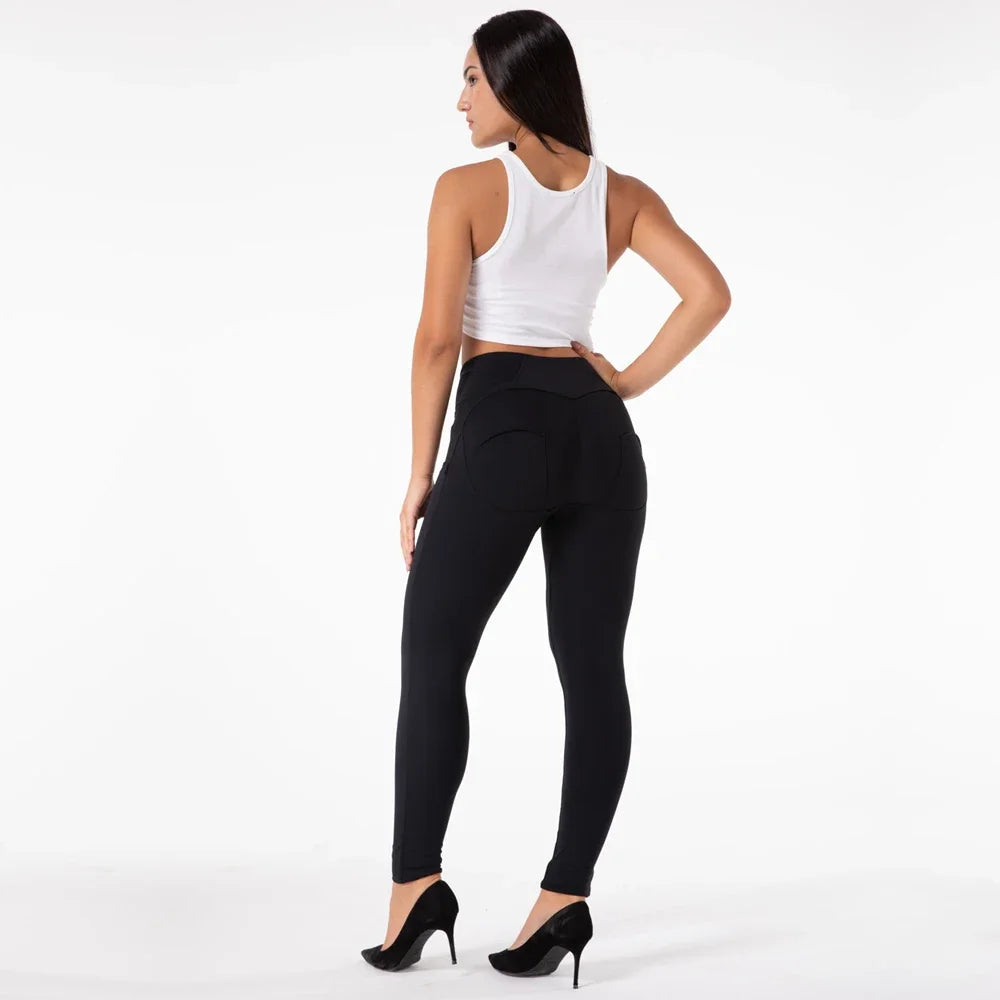 High-waisted black Shascullfites Melody leggings by Corporación Turística, shown with close-up of smooth, stretchy fabric and comfortable fit.