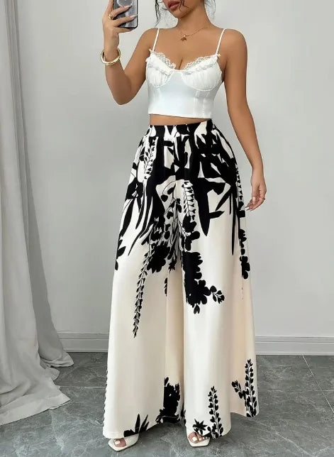 Pantalones anchos de satén sedoso con estampado floral de...