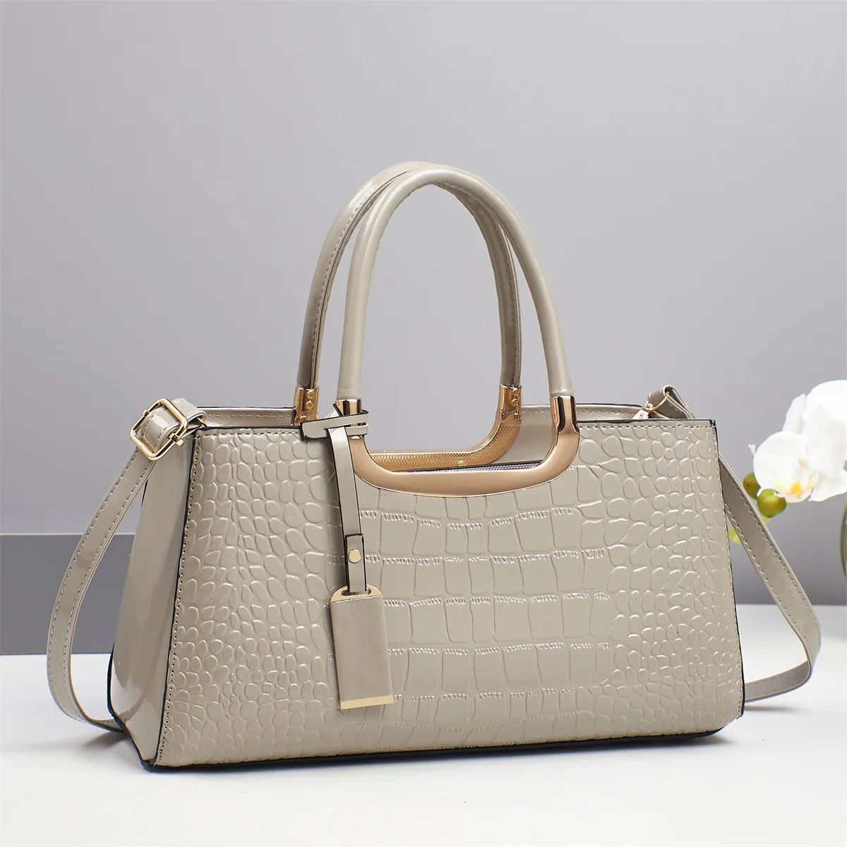 Western-style women's shoulder bag by Corporación Turística, featuring leather and decorative stitching.