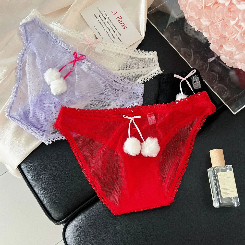 Transparent mesh panties with decorative bow, designed by Corporación Turística, featuring delicate, sheer lace details.