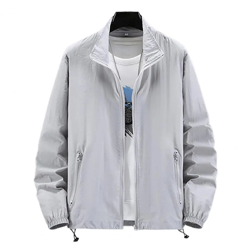 Men's outdoor jacket by Corporación Turística, warm coat with protective features, shown in a stylish outdoor setting.