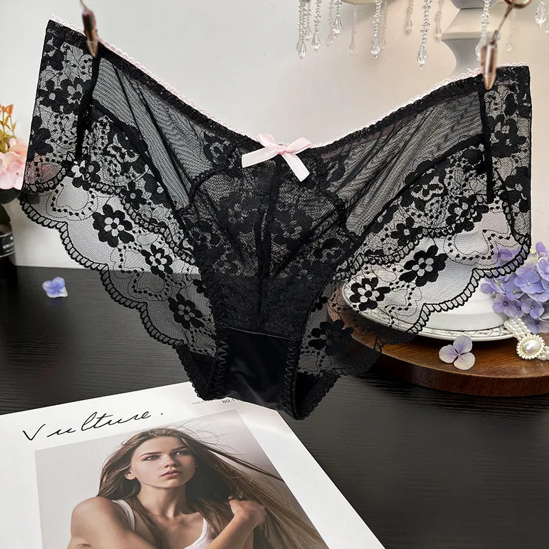 Set of three fashionable lace embroidered underwear from Corporación Turística, showcasing delicate lace details and comfortable fit.
