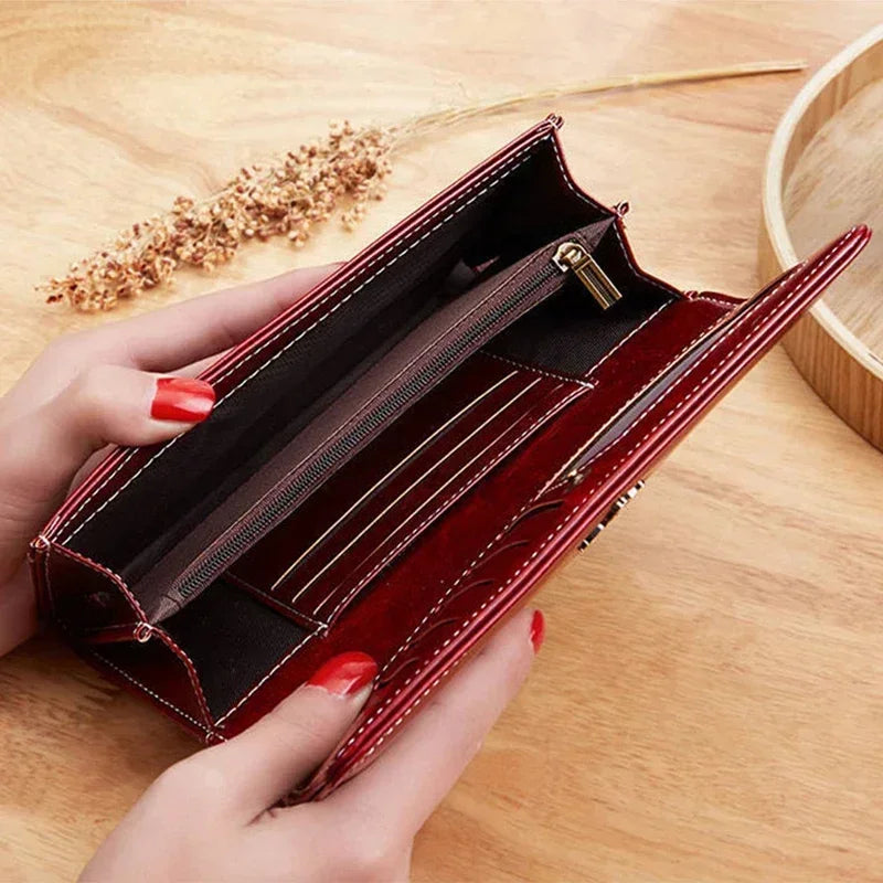 Long women's leather wallet with coin pocket and card slots, stylish leather purse by Corporación Turística.