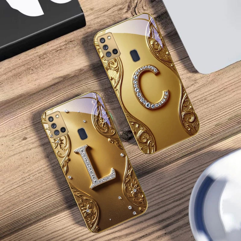 Golden crystal phone case with diamond accents from Corporación Turística, showcasing a luxurious, sparkling protective cover.