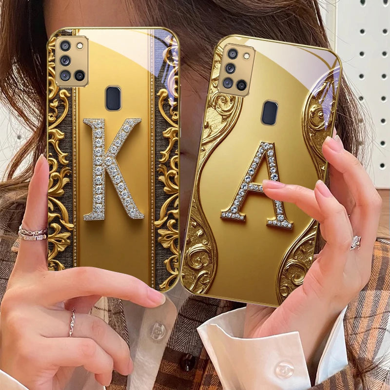 Golden crystal phone case with diamond accents, stylish protective cover for smartphones by Corporación Turística.