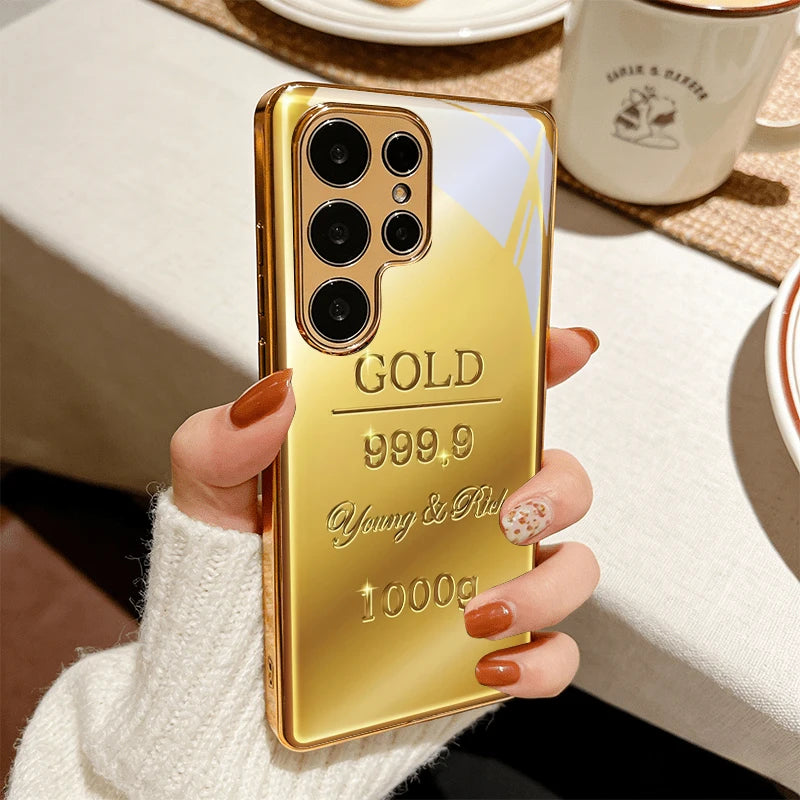 Luxurious gold phone case with bar design from Corporación Turística, stylish and protective for smartphones.