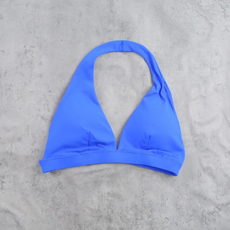 Sujetador deportivo para mujer con diseño de cuello halte...