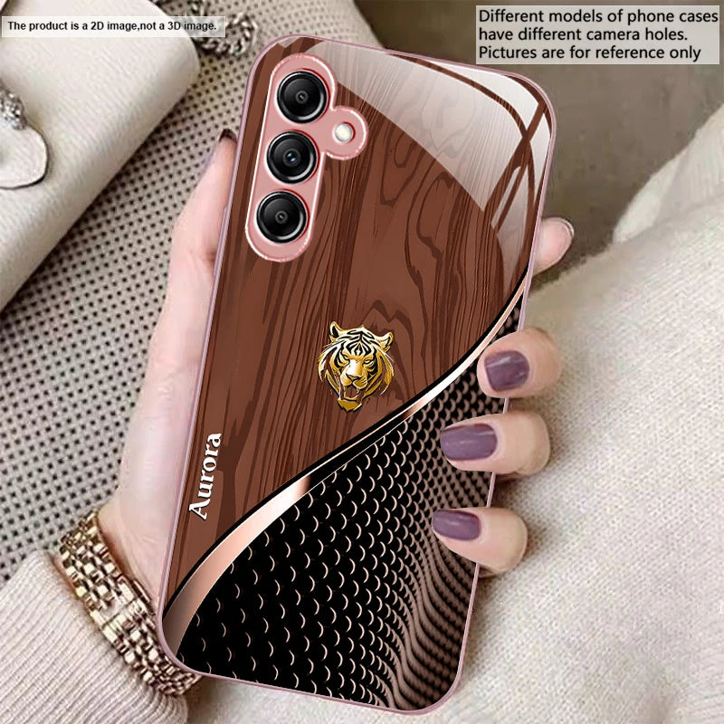 Golden tiger design glass phone case, transparent with intricate tiger illustration, fits smartphones for stylish protection.