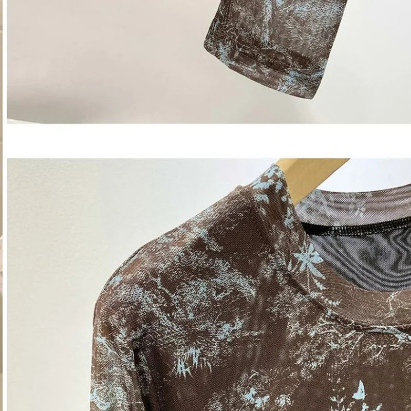 Women's lace blouse with round neckline by Corporación Turística, featuring intricate lace fabric and a stylish fit.