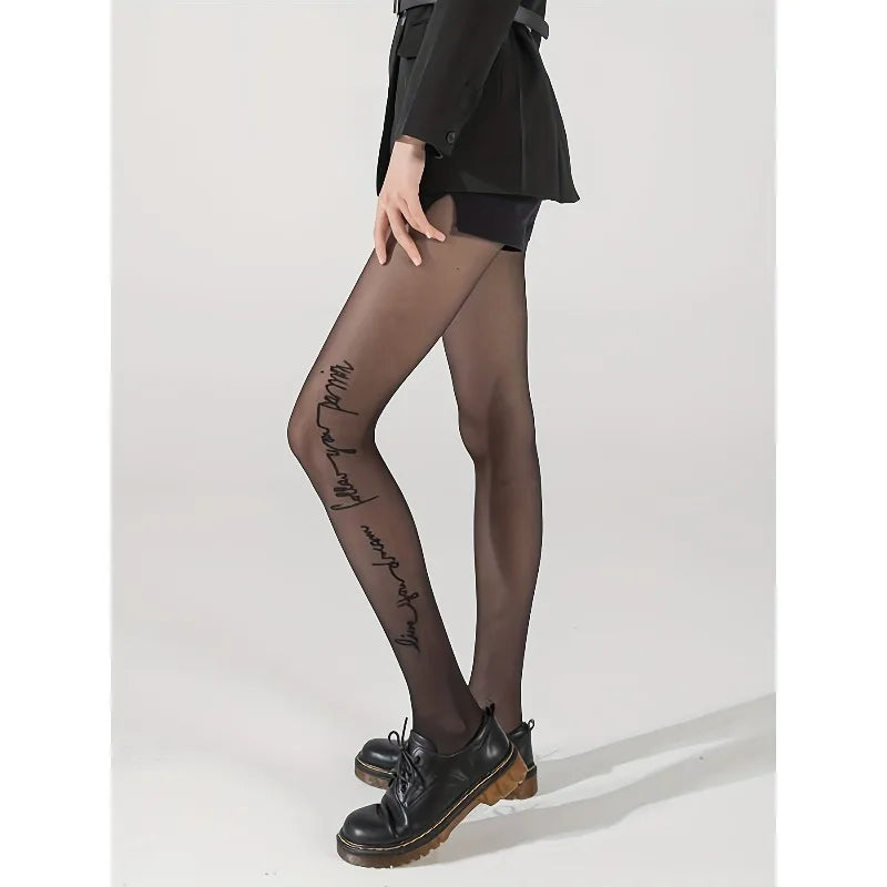 Pair of black shrimp design silk socks from Corporación Turística, featuring detailed shrimp patterns on smooth silk fabric.
