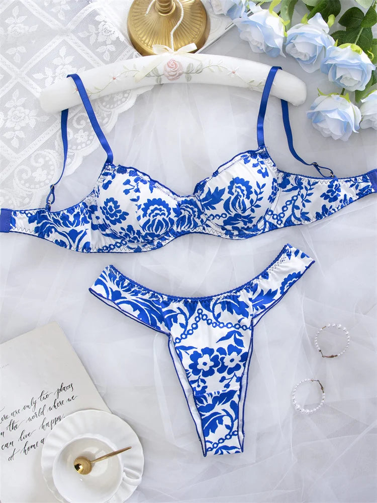 Blue floral print women's lingerie set from Corporación Turística, featuring matching bra and panties with delicate floral details.