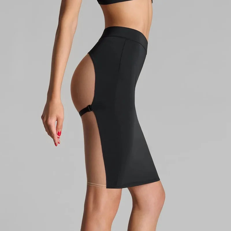 Black fitted midi mesh skirt with transparent panels, stylish and trendy from Corporación Turística.