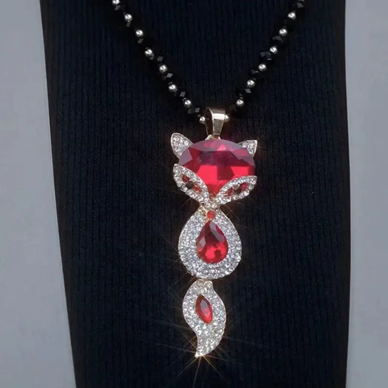 Luxury fox pendant necklace with large crystals, elegant jewelry piece from Corporación Turística featuring a stylish collar design.