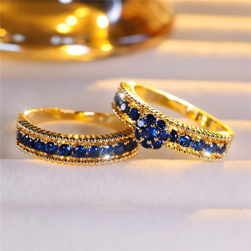 Conjunto de anillos de compromiso de piedra de circón azu...