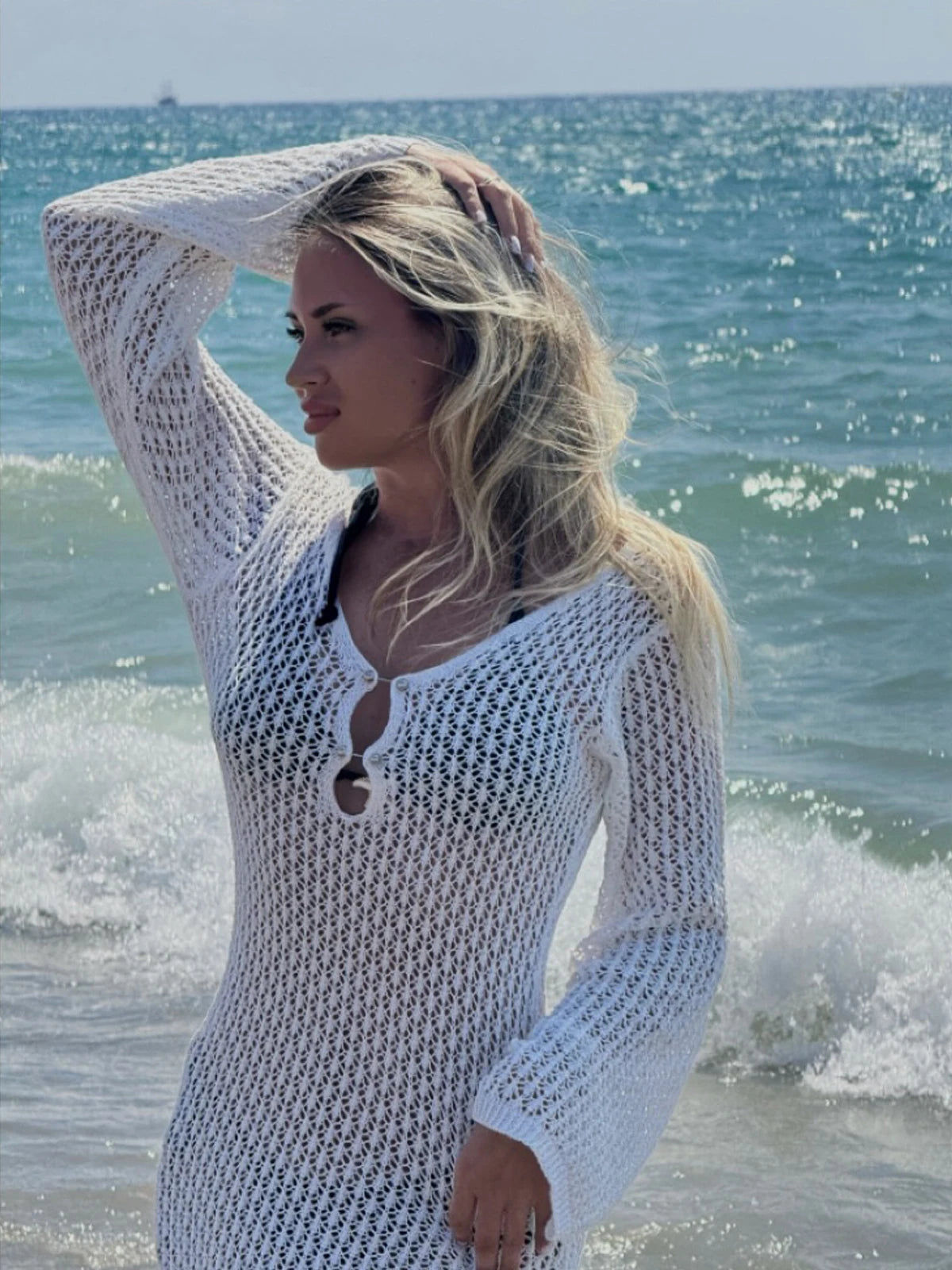 Casual short vacation dress from Corporación Turística, lightweight and comfortable for warm weather, with a relaxed fit.