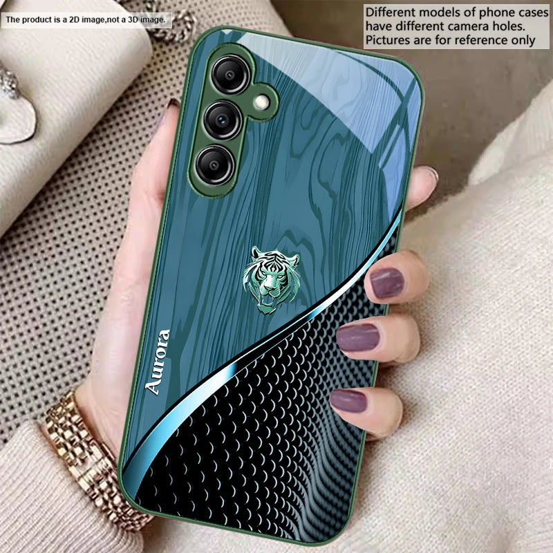 Glass phone case with a golden tiger design, featuring vibrant tiger artwork on a transparent protective cover.