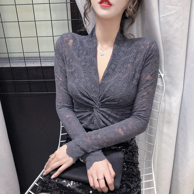 Elegant lace V-neck blouse for women, stylish and comfortable, featuring intricate lace details and a flattering fit.
