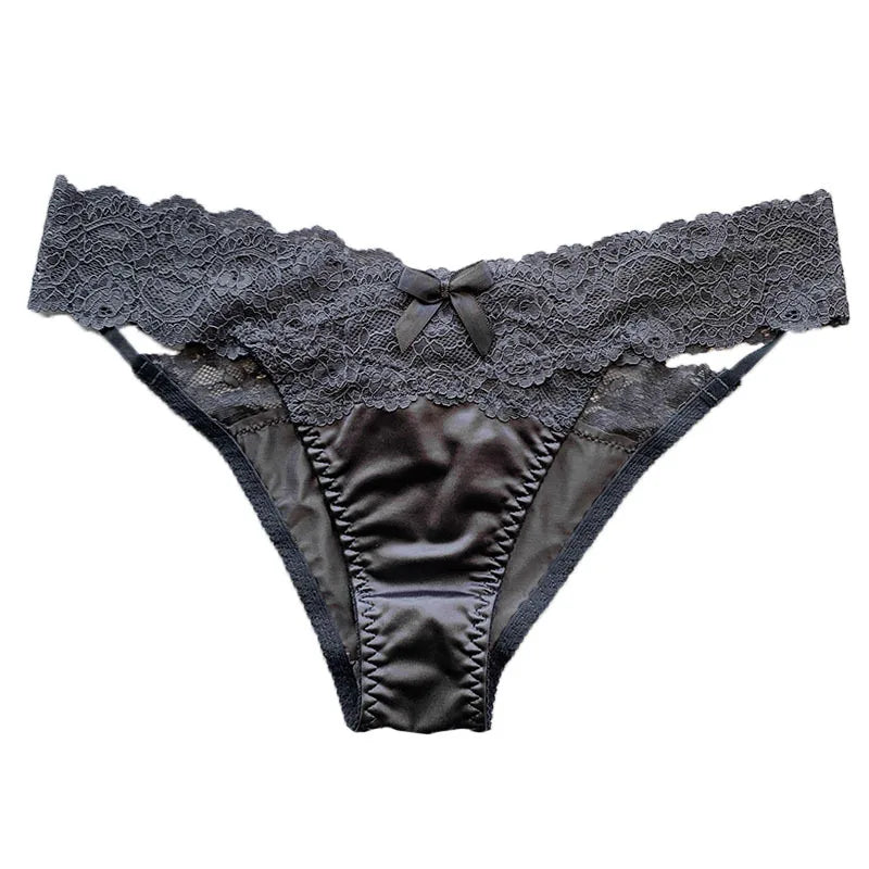 Set of four fashionable satin and lace underwear from Corporación Turística, featuring delicate lace details and smooth satin fabric.