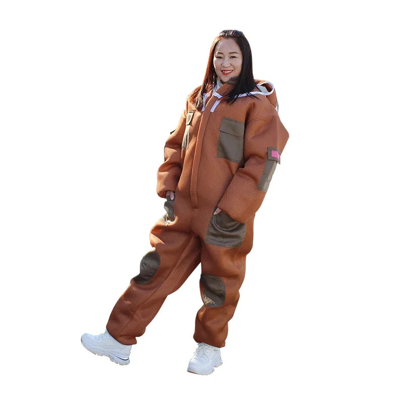 Protective bee suit for beekeeping by Corporación Turística, featuring safety mesh and full-body coverage for apiary safety.