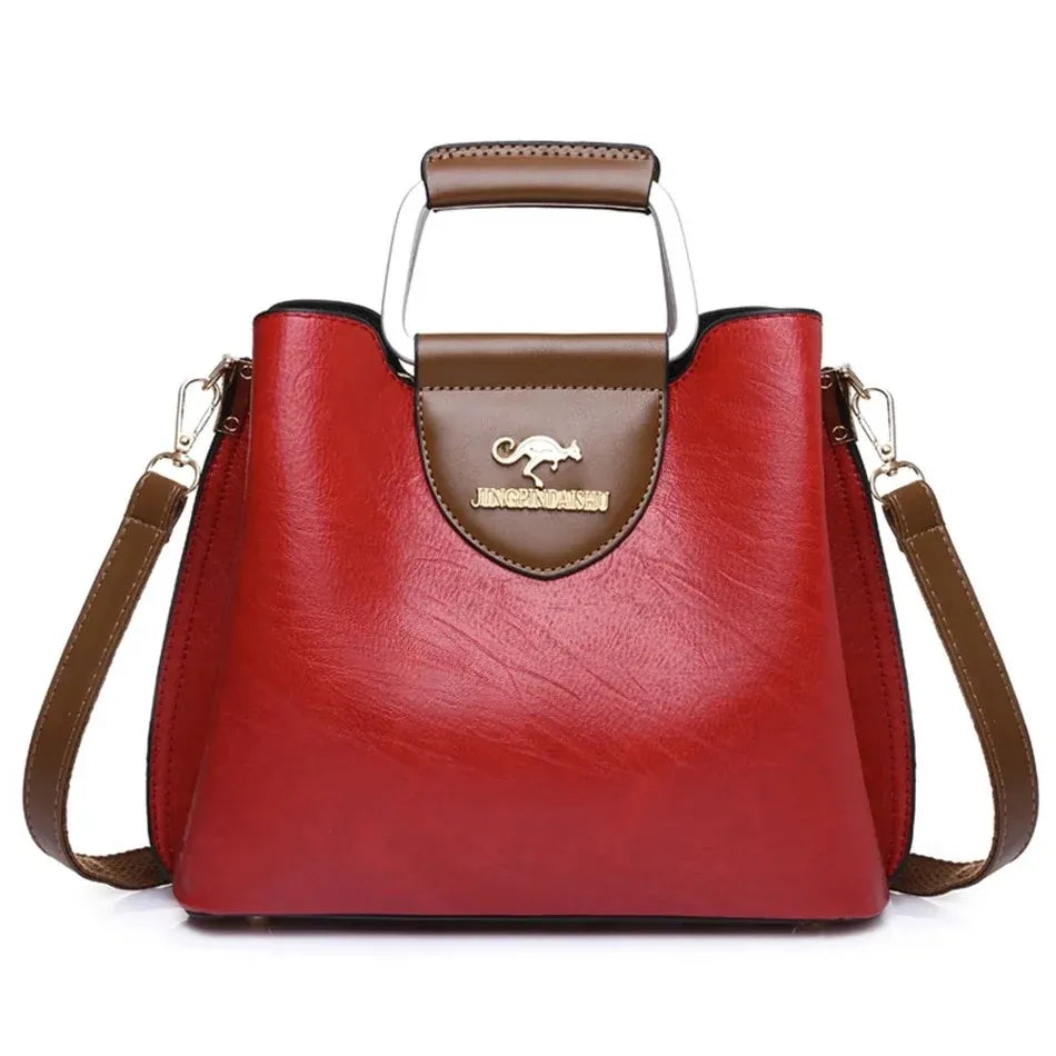 Genuine leather women's handbag by Corporación Turística, stylish small leather purse with handles and sleek design.