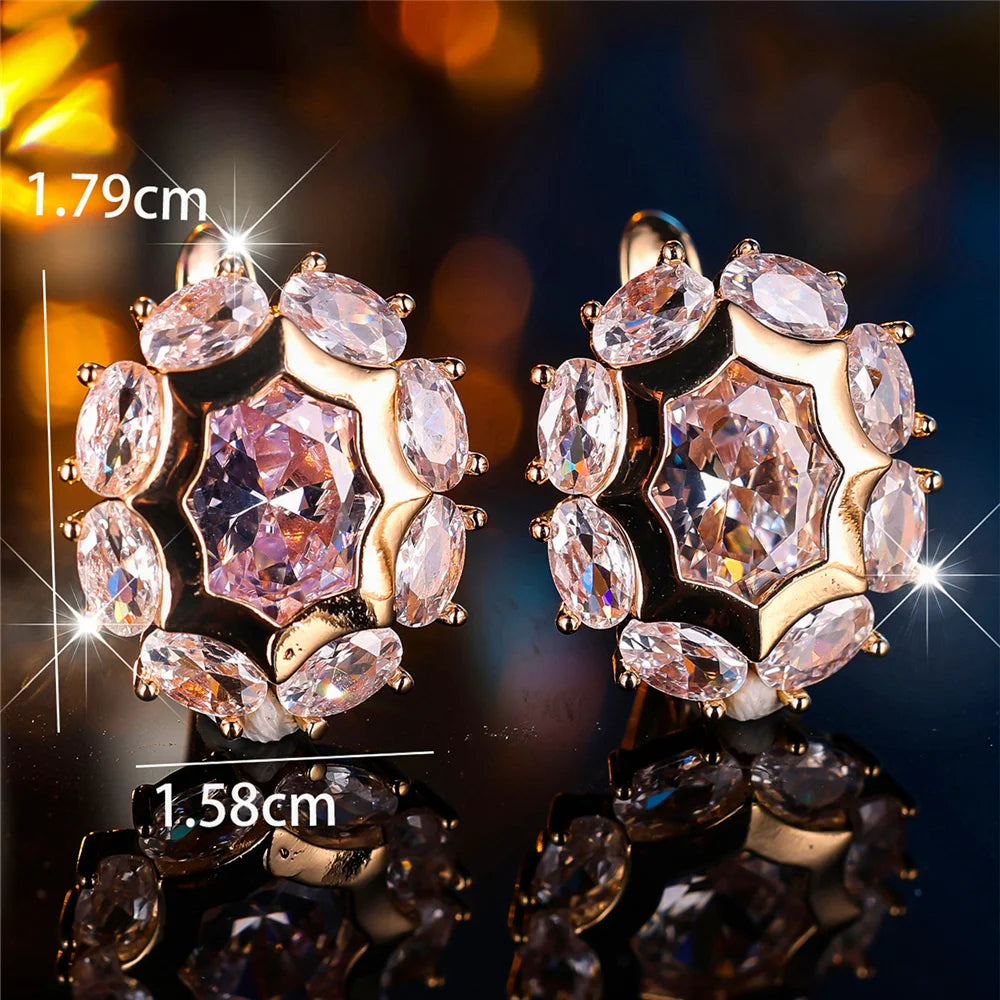 Oval cubic zirconia hoop earrings for women, shiny silver-tone jewelry with elegant, oval-shaped stone accents.