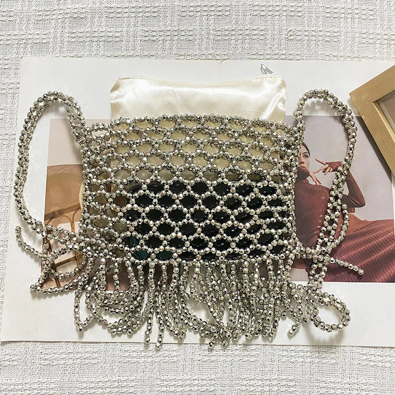 Handmade woven bag with beaded details and tassels by Corporación Turística, featuring intricate textile craftsmanship.