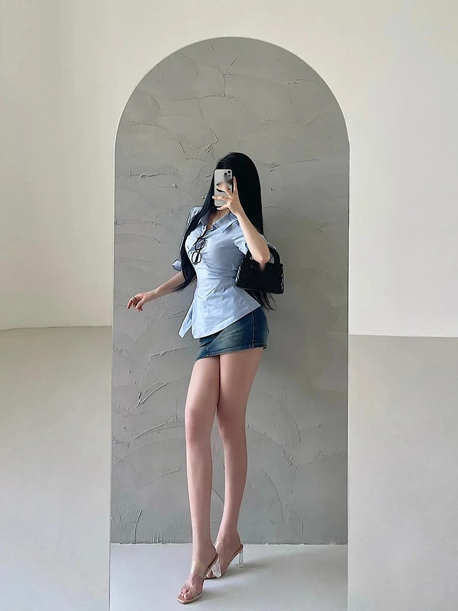 Women's safety denim miniskirt from Corporación Turística, showing the stylish, fitted denim skirt with secure stitching and classic design.