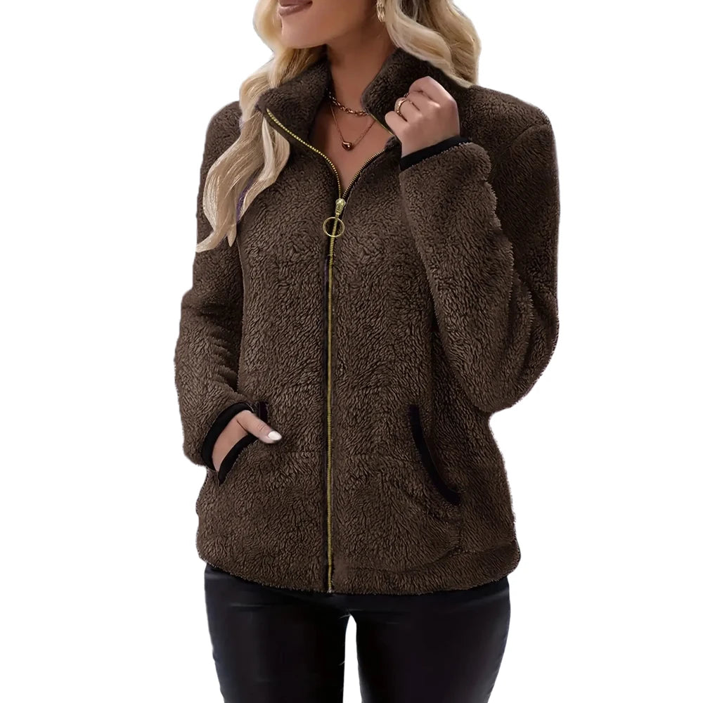 Women's full-zip fleece jacket by Corporación Turística, cozy and stylish with a front zipper and warm inner lining.