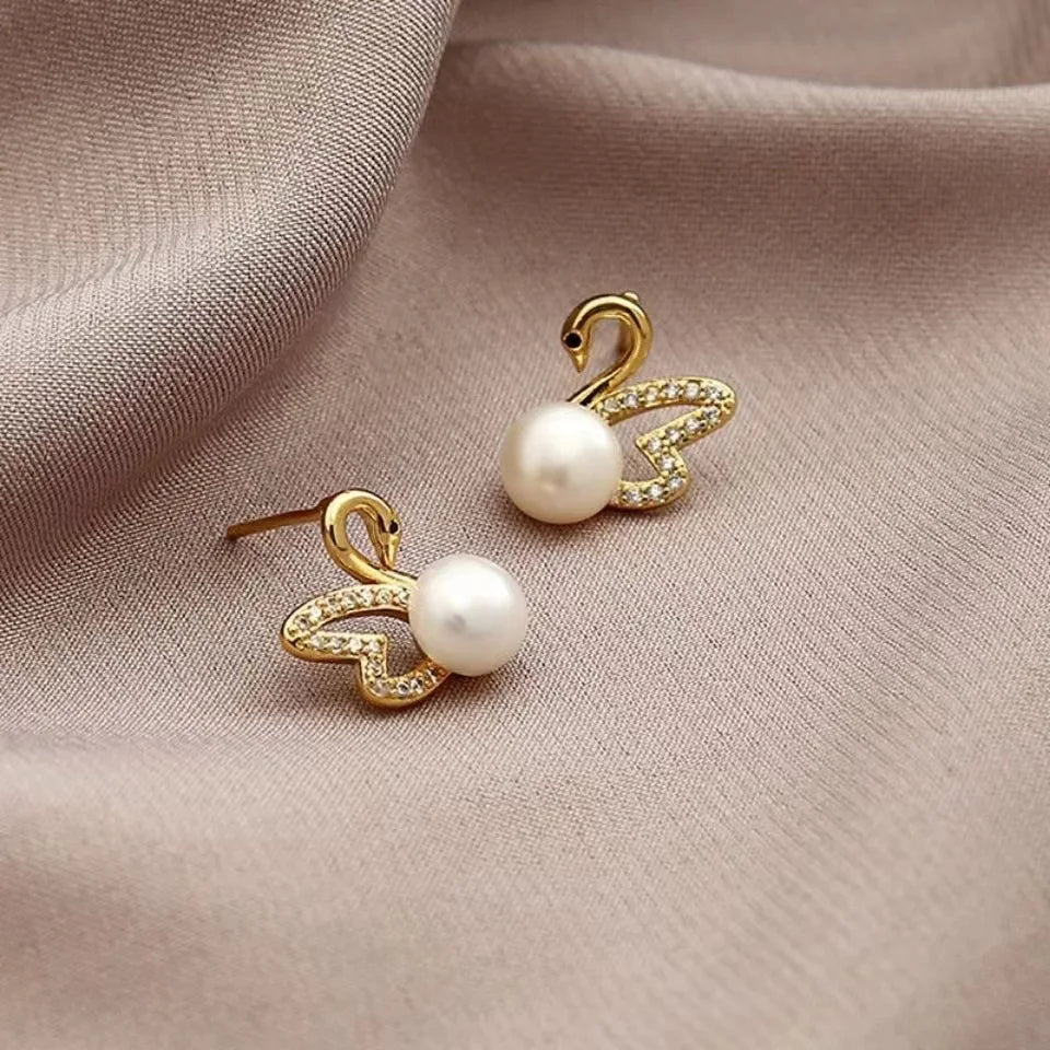 Pendientes de cisne de cristal hueco de aguja de plata 92...