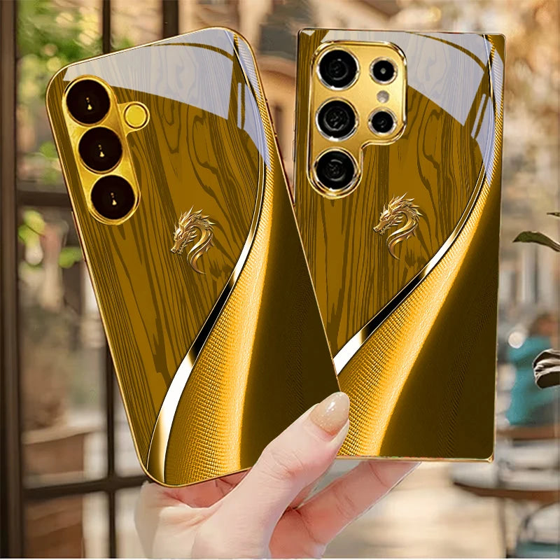 Golden galvanized phone case featuring a dragon design from Corporación Turística, showcasing intricate dragon artwork on the cover.