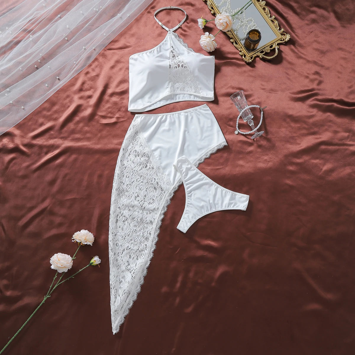 Conjunto de tres piezas de lencería sexy con falda irregu...