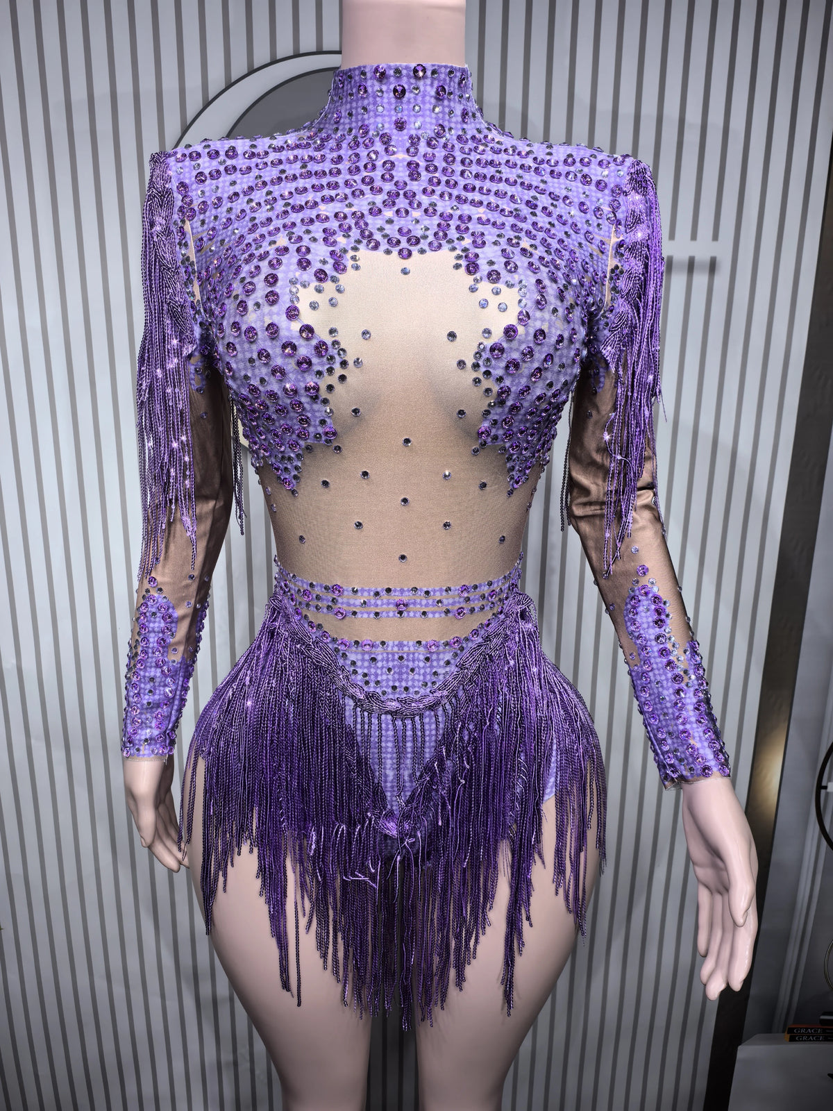 Fitted sexy women's leotard from Corporación Turística featuring dancewear with fringe details, perfect for performance or dance practice.