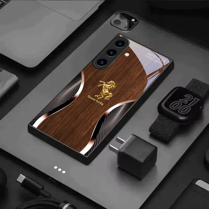 Black crystal phone case with gold steed decoration from Corporación Turística, designed for a secure fit and elegant protection.