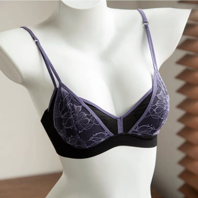 Feminine lingerie set featuring a triangular bra from Corporación Turística, displayed on a neutral background.