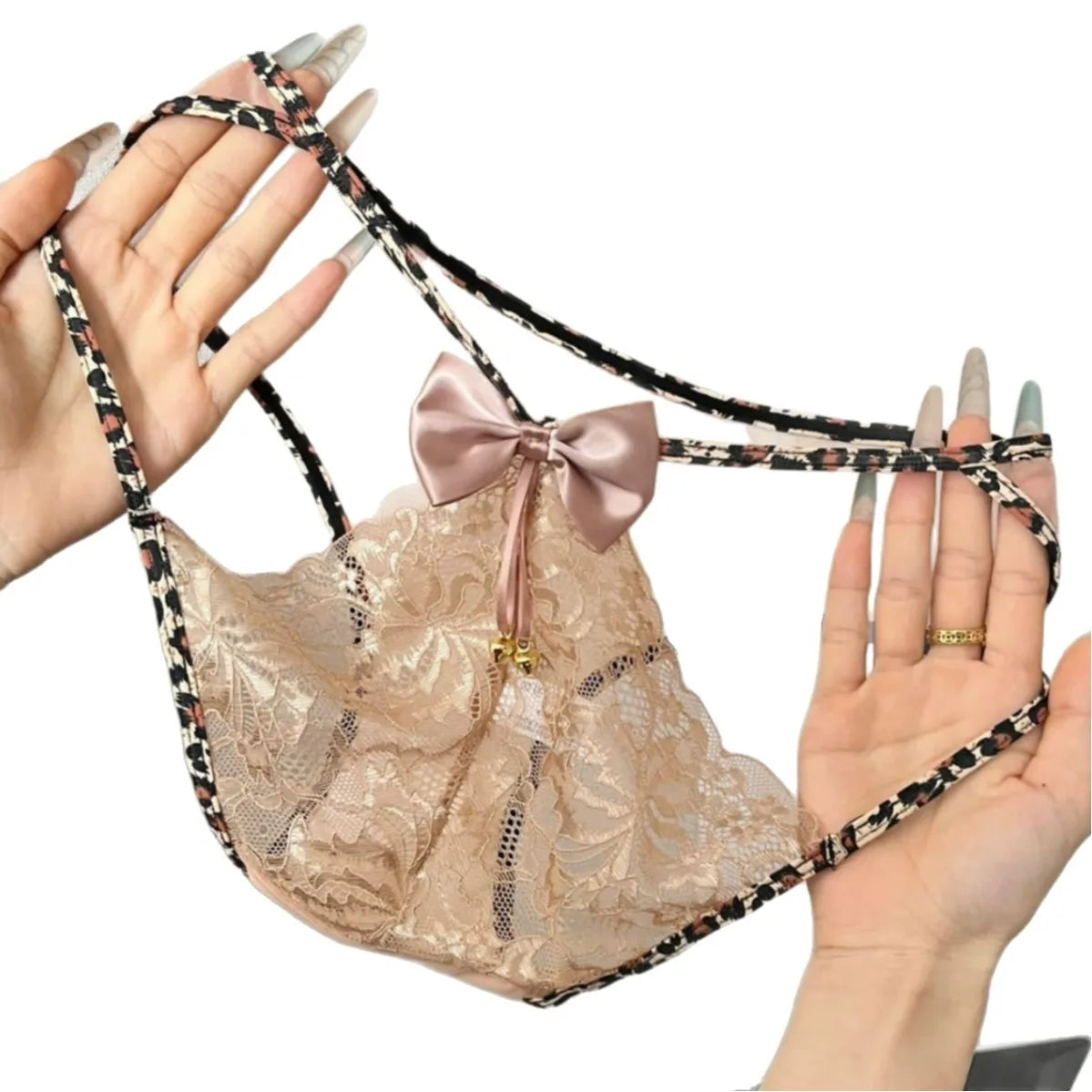 Leopard print women's lace briefs from Corporación Turística, featuring comfortable, stylish lingerie with animal print design.