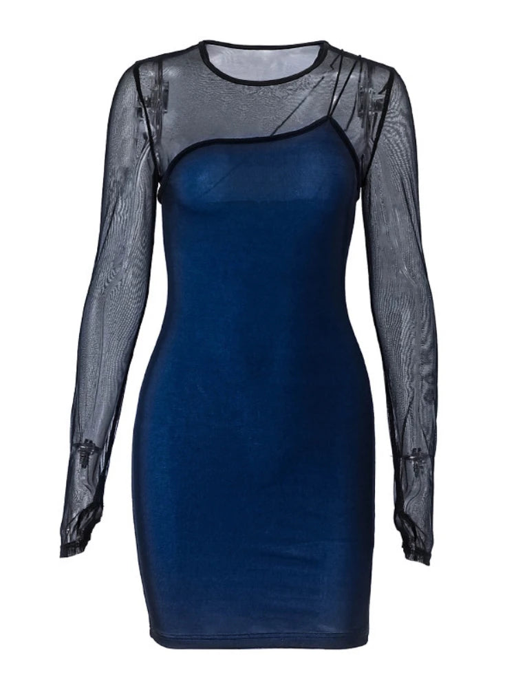 Long-sleeve transparent lace minivestido by Corporación Turística, featuring intricate lace details and a fitted silhouette.