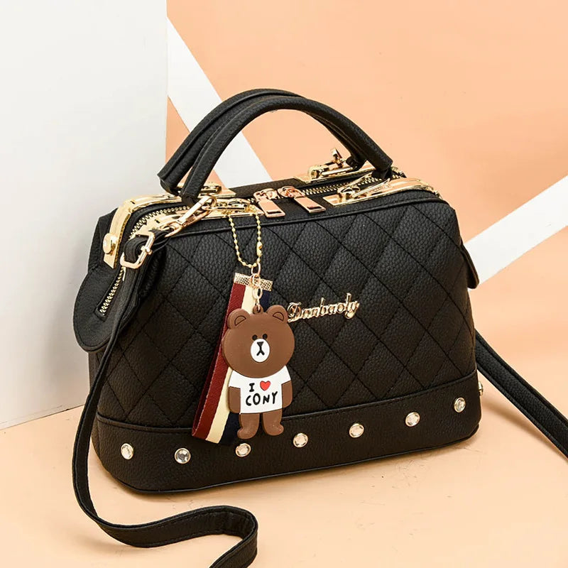 Small square women's handbag in high-quality material, stylish black purse from Corporación Turística.