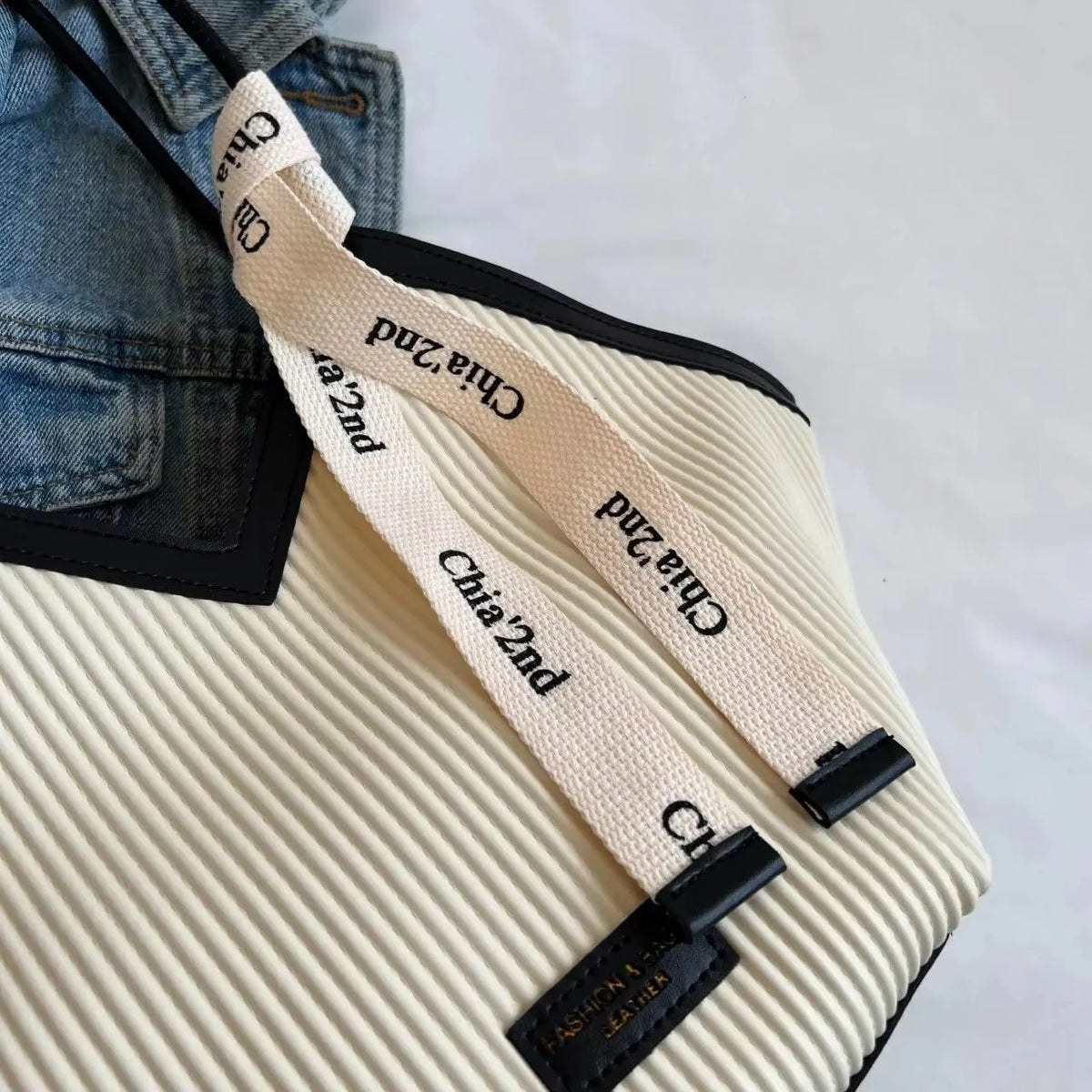 Large Korean-style women's tote bag made of durable canvas fabric with stylish design and spacious interior.