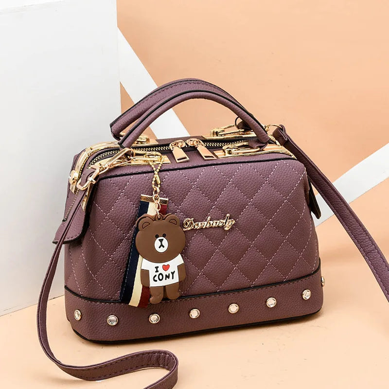 Small square high-quality women's handbag by Corporación Turística, featuring a stylish design and compact size.