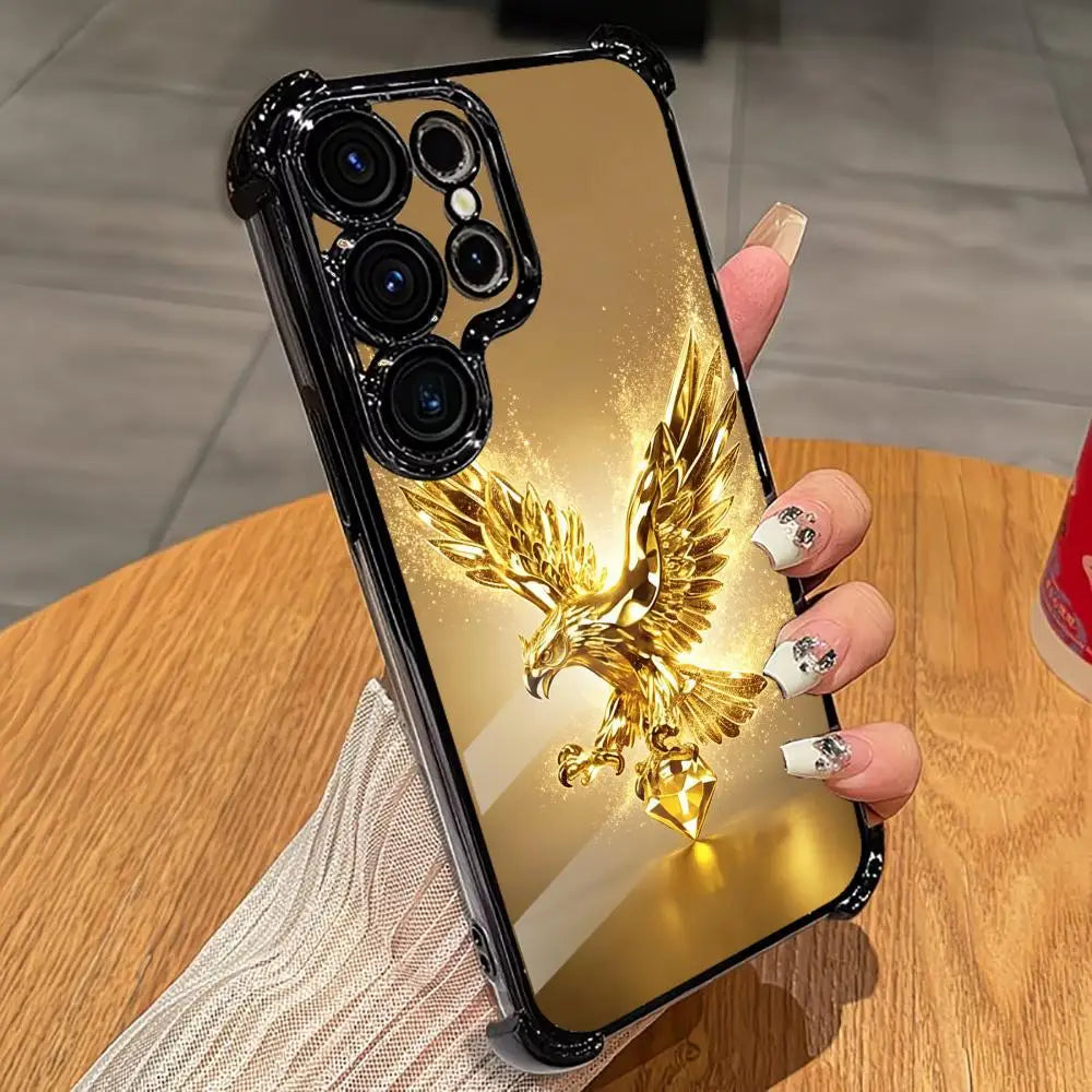 Gold eagle design phone case by Corporación Turística featuring a shiny, decorative accessory for smartphones.