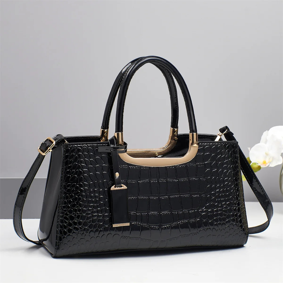 Western-style women's shoulder bag by Corporación Turística, featuring authentic design and detailed craftsmanship.
