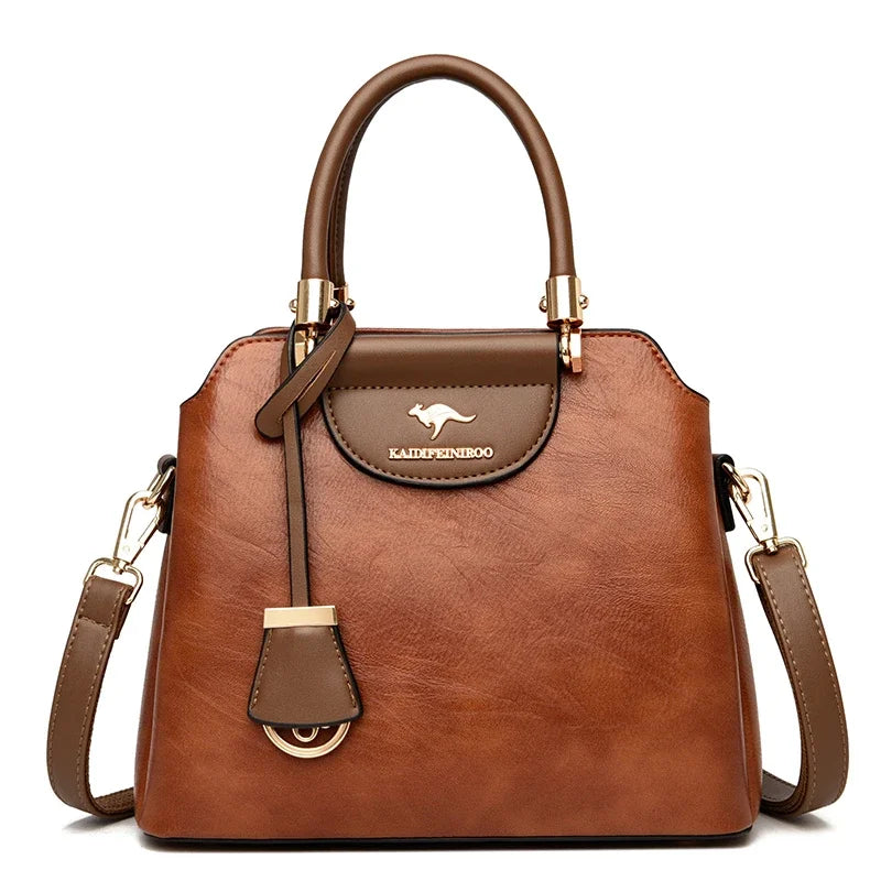 Small leather crossbody bag for women by Corporación Turística, featuring a stylish shoulder strap and compact design.