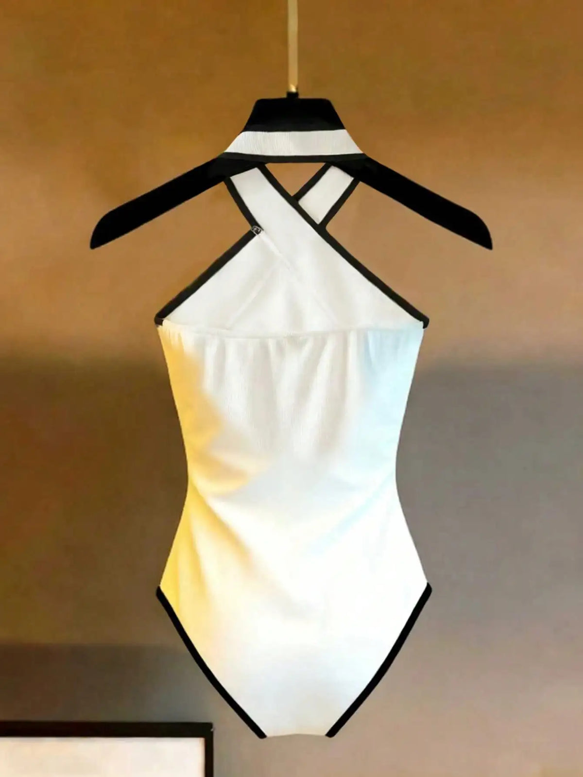 Halter body for women with contrast trim from Corporación Turística, featuring a fitted design and stylish ribbed details.