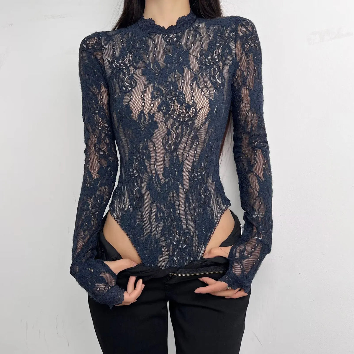 Women's Nuevo body by Corporación Turística with high neck and long sleeves, shown in a close-up front view.